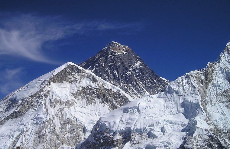 A sherpa guide sets a new record climbing Mount Everest for the 25th time